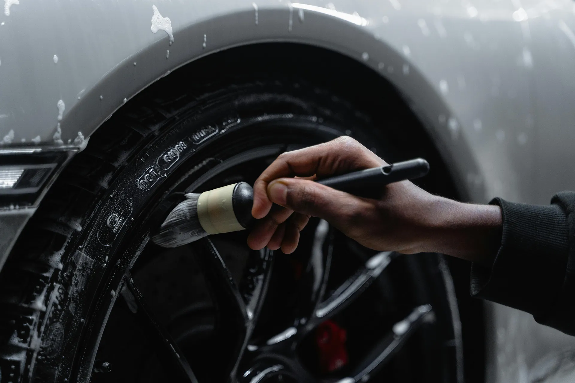 Alloy wheel being cleaned
